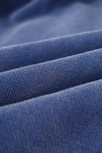 Balenciaga blue shorts fabric close-up showing knit texture and seam detail