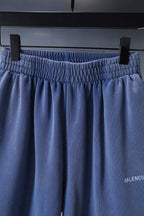 Balenciaga blue shorts with elastic waistband and draped fabric panels