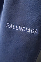 Balenciaga logo embroidered on blue knit shorts fabric