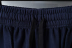 Navy elastic waistband with gathered fabric texture