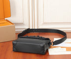Men's black leather crossbody bag with adjustable strap and top zip opening