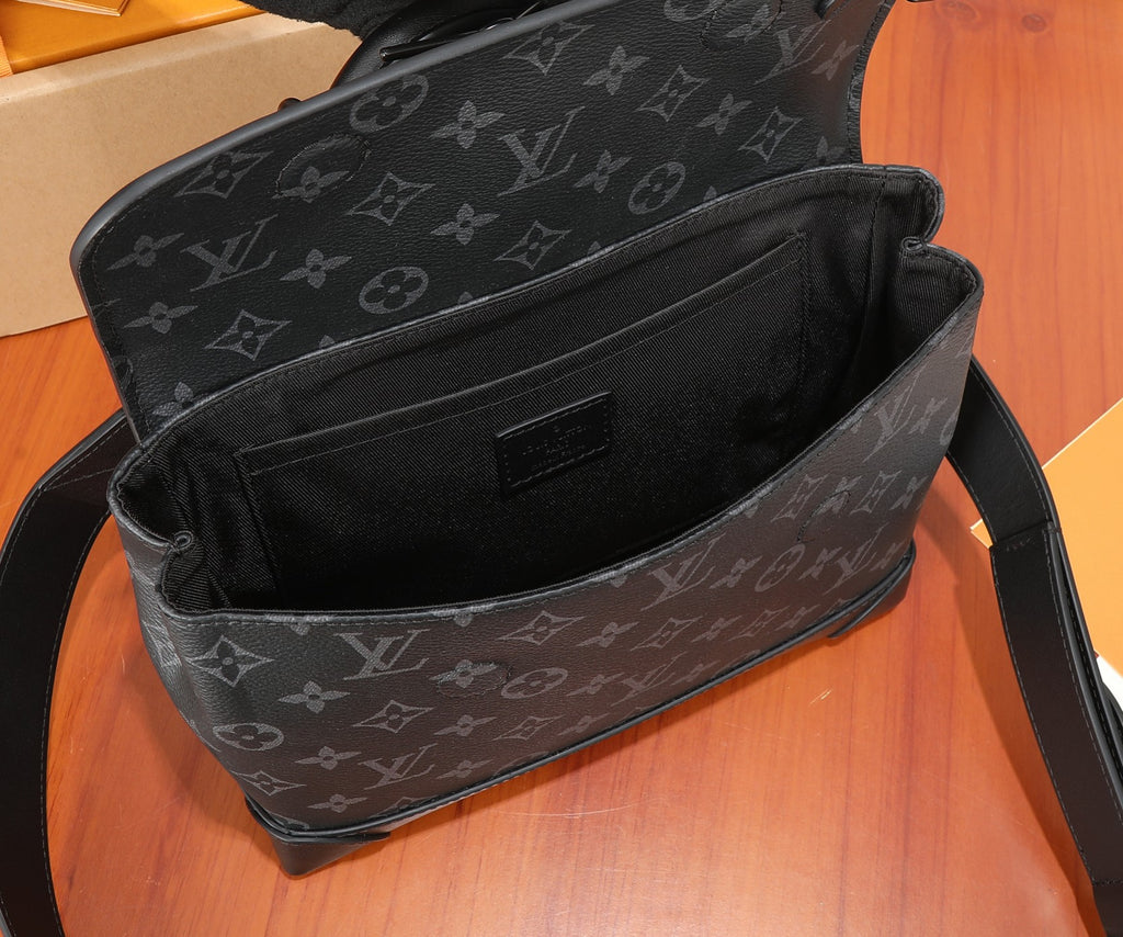Louis Vuitton men's bag open view: black interior with monogram outer panel.