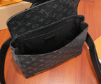 Louis Vuitton bag open view showing black interior lining and monogram exterior