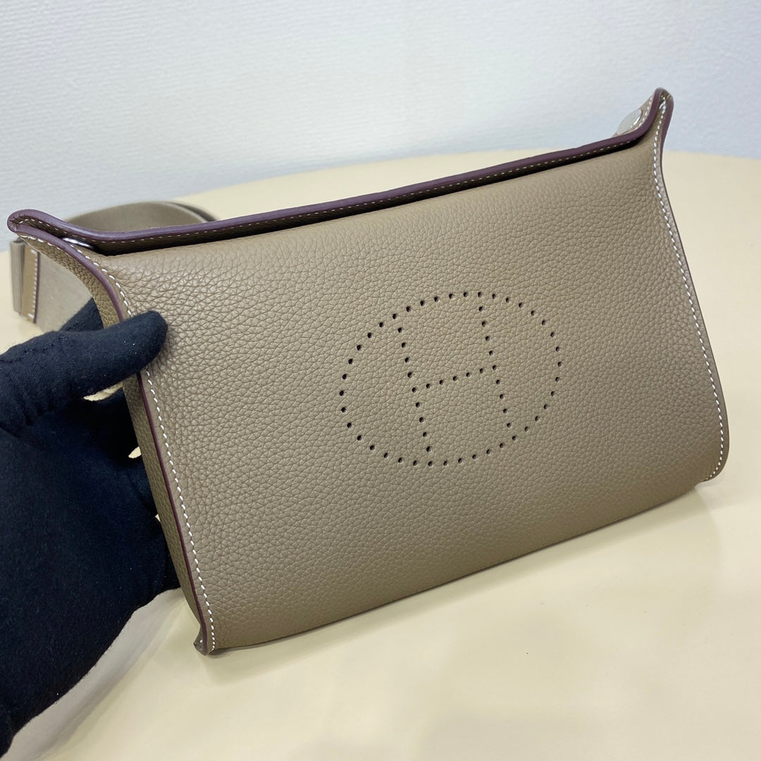 Hermes taupe leather crossbody bag with front logo and leather top trim