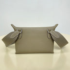 Hermes crossbody bag with taupe leather front and two side D-ring attachment points