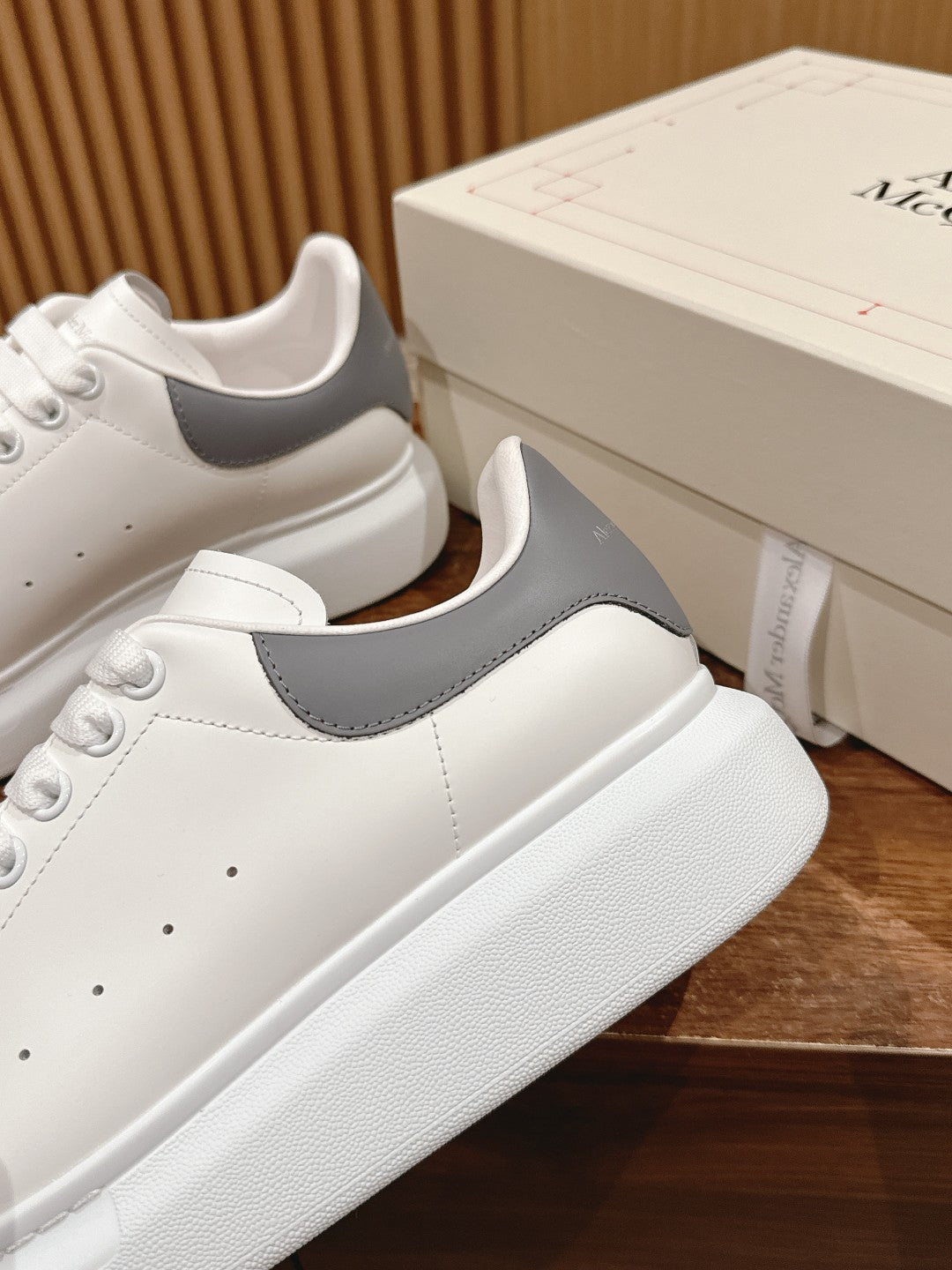 Alexander McQueen white leather sneaker with gray side panel