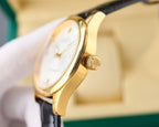 Rolex Datejust wristwatch side view with gold-tone case and black leather strap