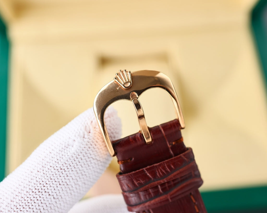 Rolex watch case back view with burgundy leather strap