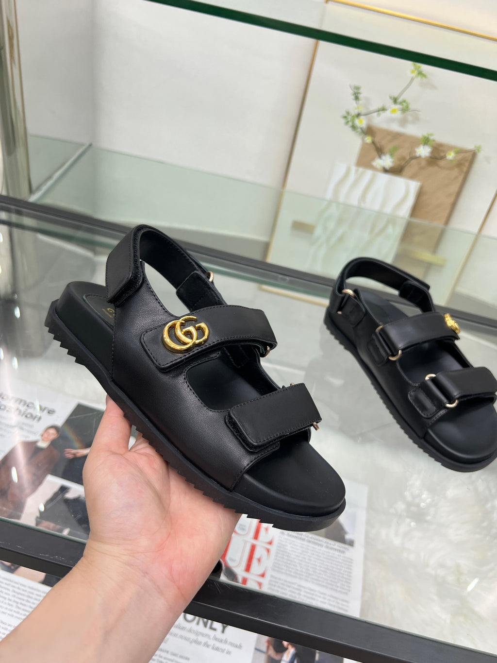 Gucci black platform sandals with double straps and gold buckle detail