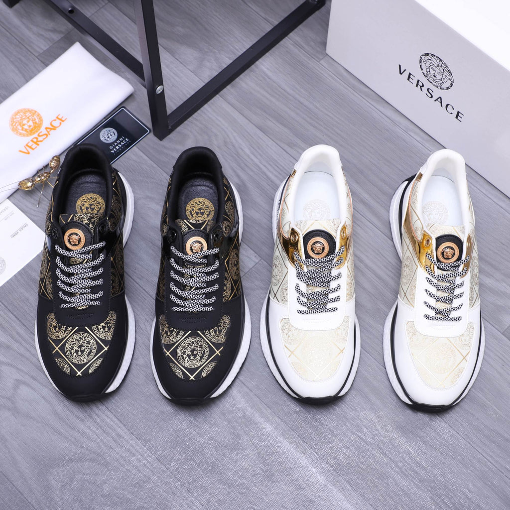 Versace sneakers in black and white with patterned laces and gold emblem detailing