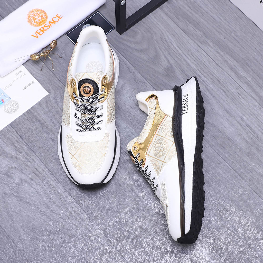 Versace sneakers set: one white and gold with lace trim, one angled view showing side profile