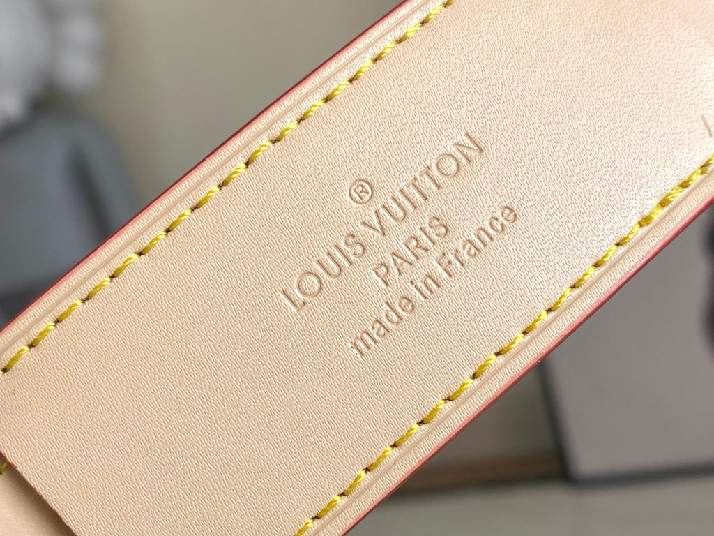 Louis Vuitton leather label patch: Paris made in France, on bag edge