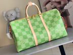 Louis Vuitton green checkered tote-style bag with tan top handles and front zipper