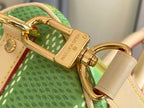 Louis Vuitton green bag top clasp with beige leather label and logo