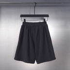 Balenciaga pleated shorts, loose silhouette with elastic waist, dark color