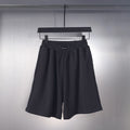 Balenciaga pleated shorts with elastic waistband, dark fabric