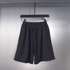 Balenciaga pleated shorts with elastic waistband, dark fabric