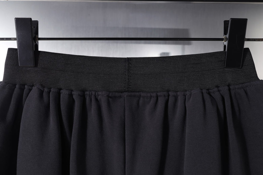 Balenciaga elastic waistband and pleats on dark shorts