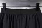Balenciaga elastic waistband and pleats on dark shorts