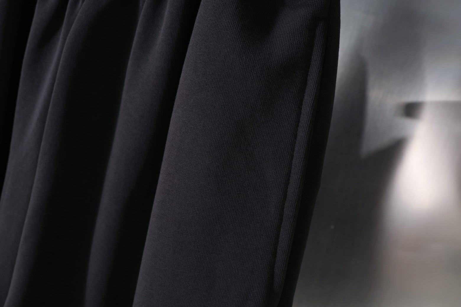 Balenciaga shorts front panel with pleats, dark textured fabric