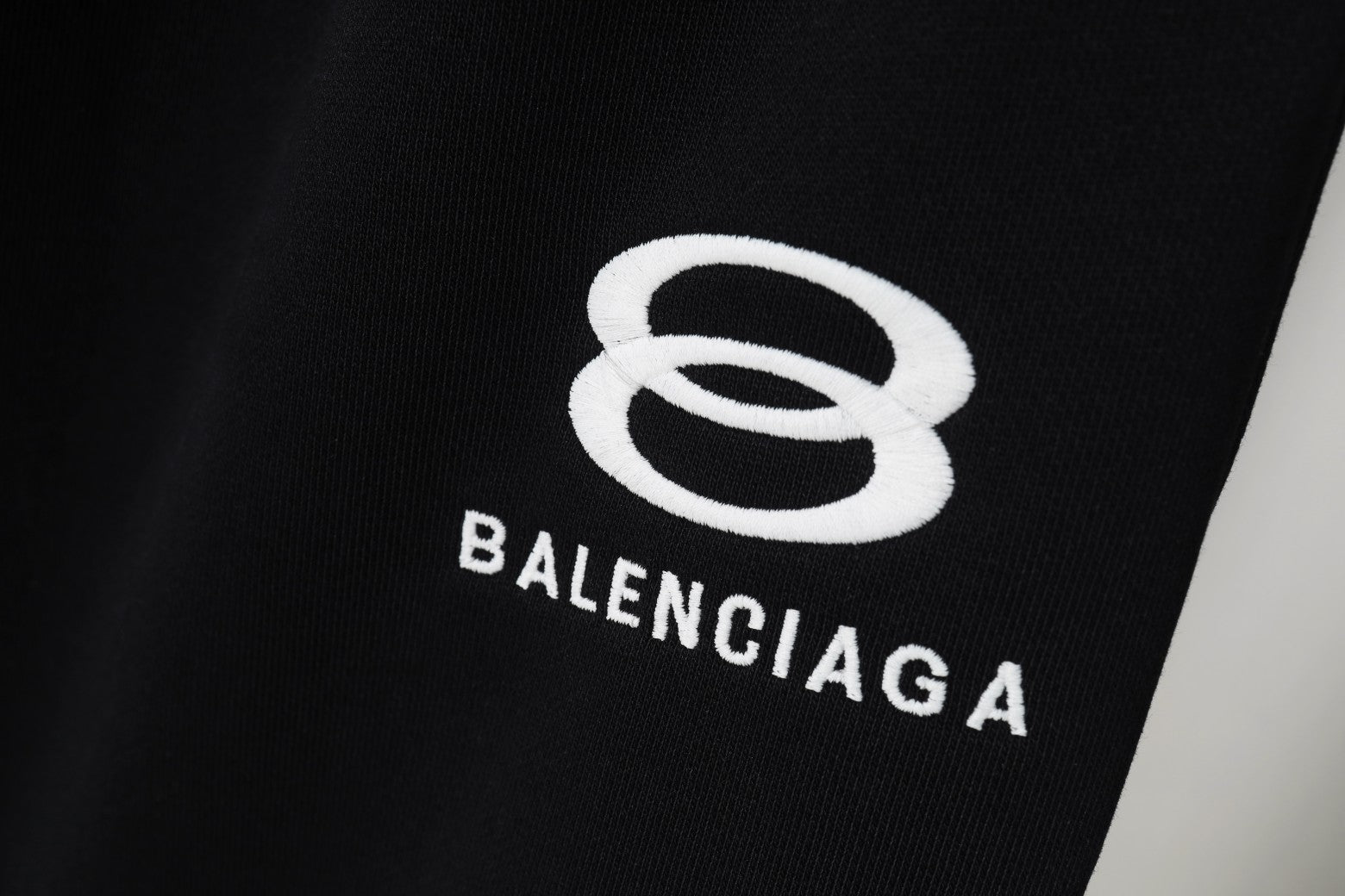 Balenciaga logo print on black fabric