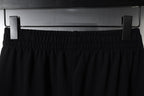 Black elastic waistband with gathered top edge