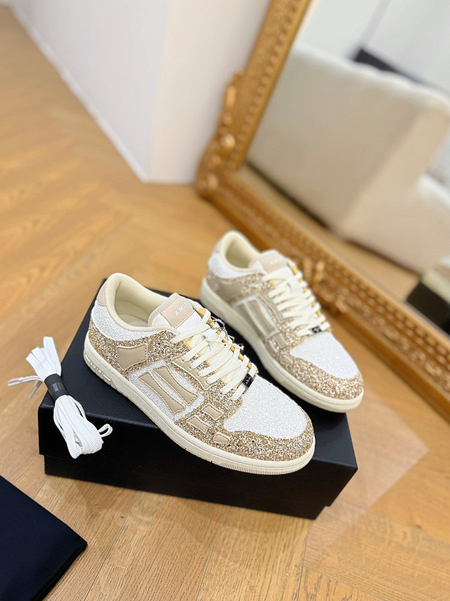 Amiri lace-up sneakers with white and gold glitter panels, chunky rubber sole