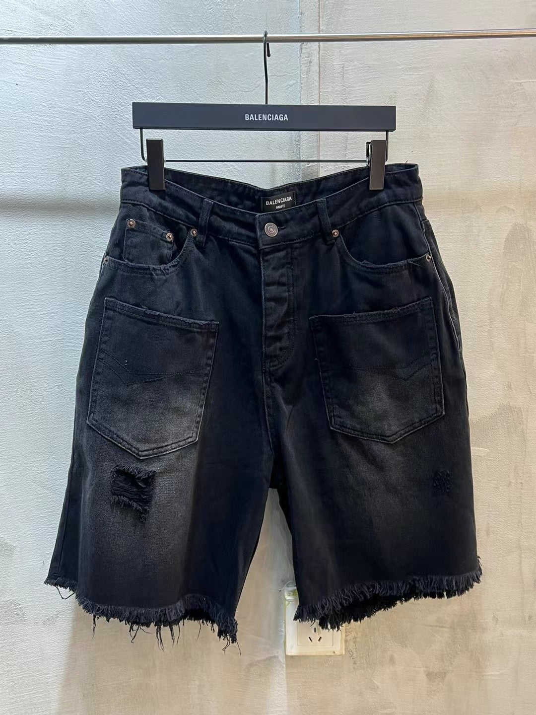 Balenciaga denim jeans shorts, dark blue, distressed, frayed hem, patch pockets