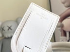 Louis Vuitton leather interior tag with stitching on white handle
