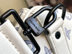 Louis Vuitton black hardware rings on white monogram bag strap