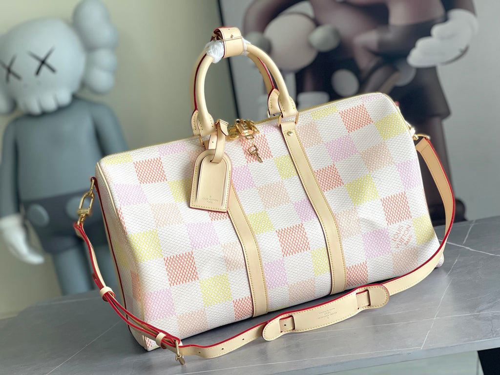 Louis Vuitton bag with multicolor check canvas, cream leather trim, top handles and strap