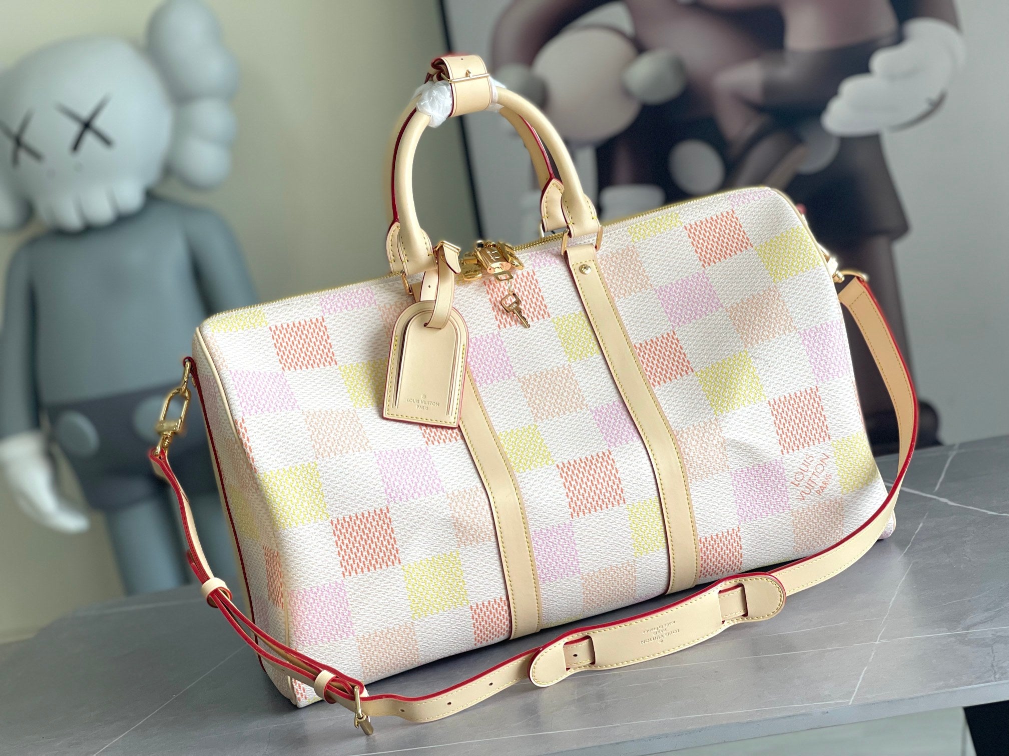 Louis Vuitton bag with multicolor check canvas, cream leather trim, top handles and strap