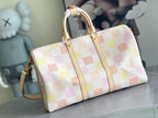 Louis Vuitton duffel-style bag with multicolor check canvas and cream leather straps