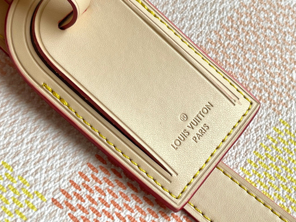 Louis Vuitton Paris leather patch with gold lettering and contrast edge stitching
