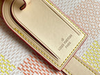 Louis Vuitton Paris leather patch with gold lettering and contrast edge stitching