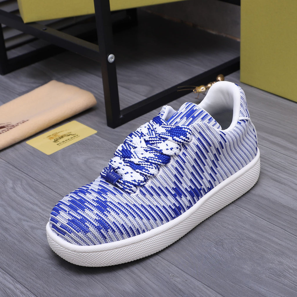 Blue and white knit lace-up sneaker with textured white outsole