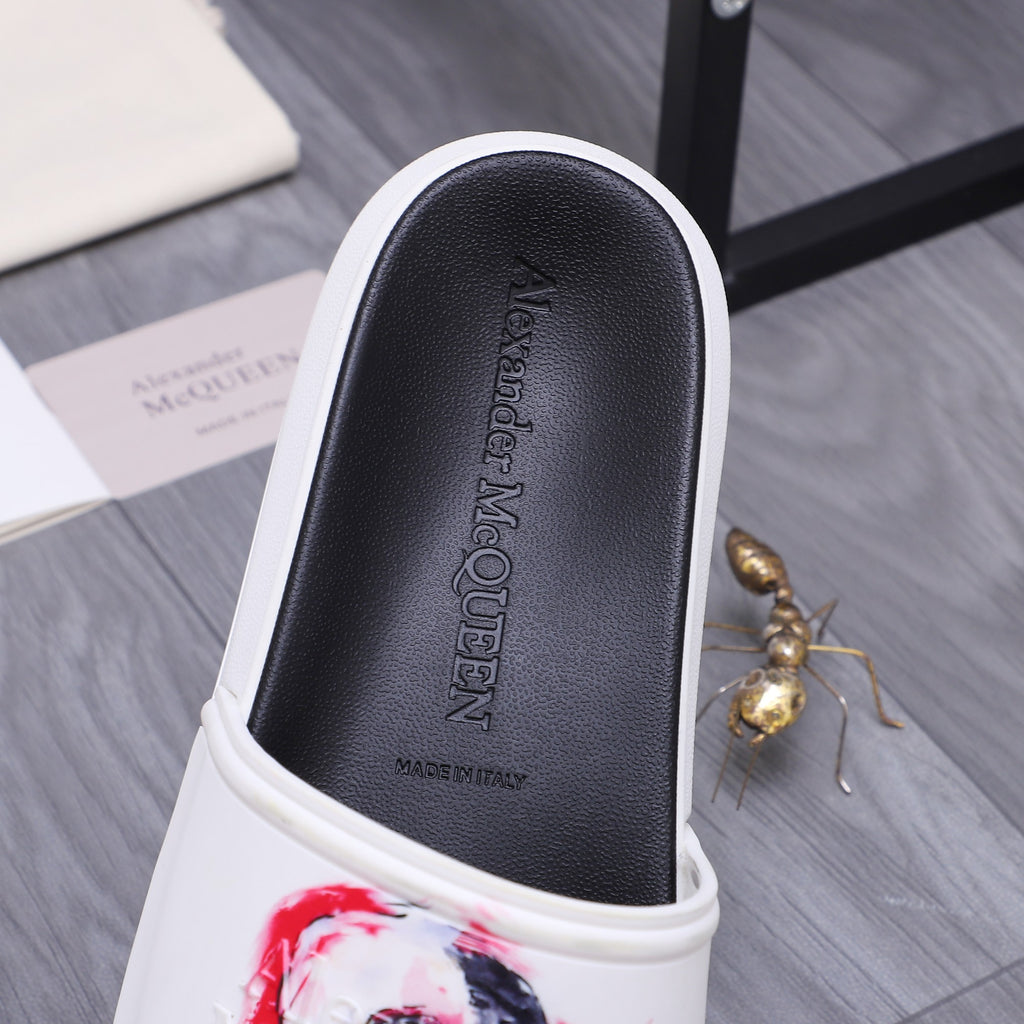 Alexander McQueen slide sandal footbed with embossed logo, black leather-style