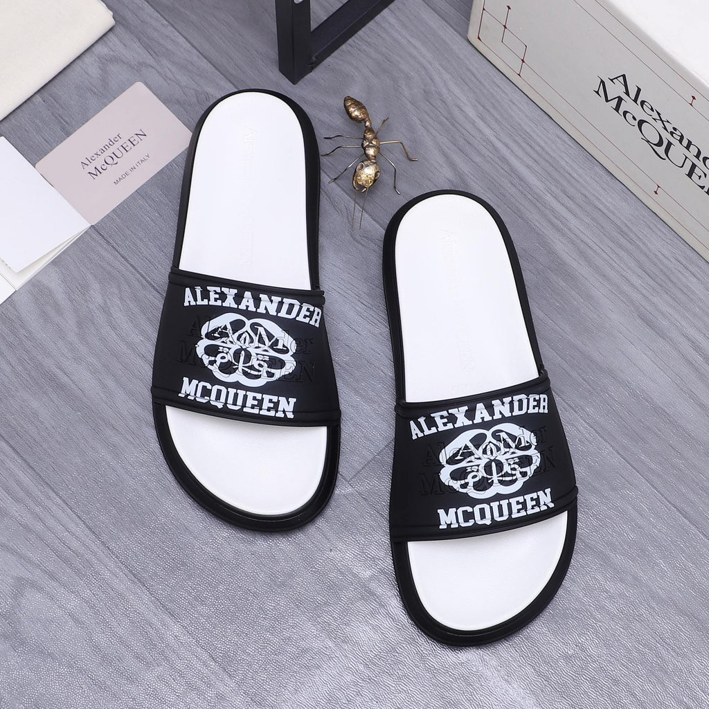 Alexander McQueen slide sandals, black logo bands on white footbeds