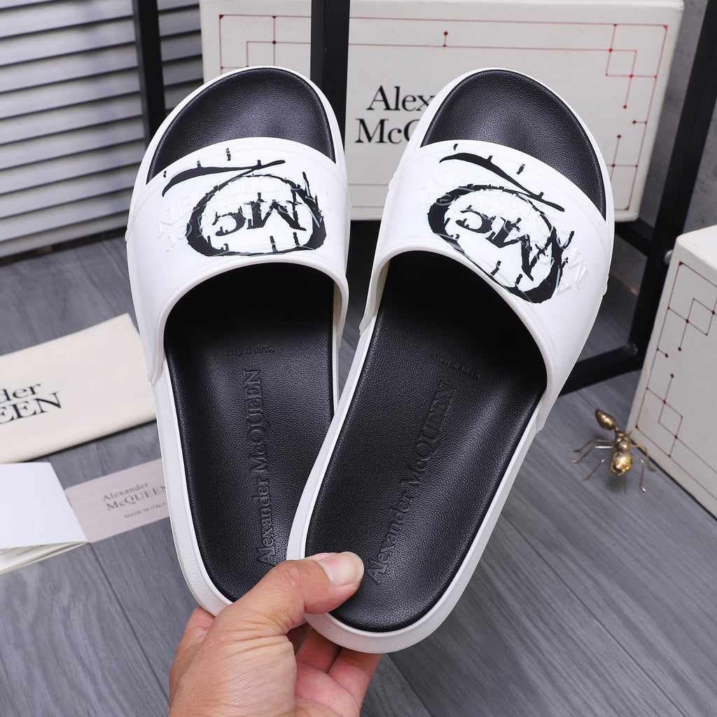 Alexander McQueen slide sandals, white upper with black insole and graffiti-style graphic