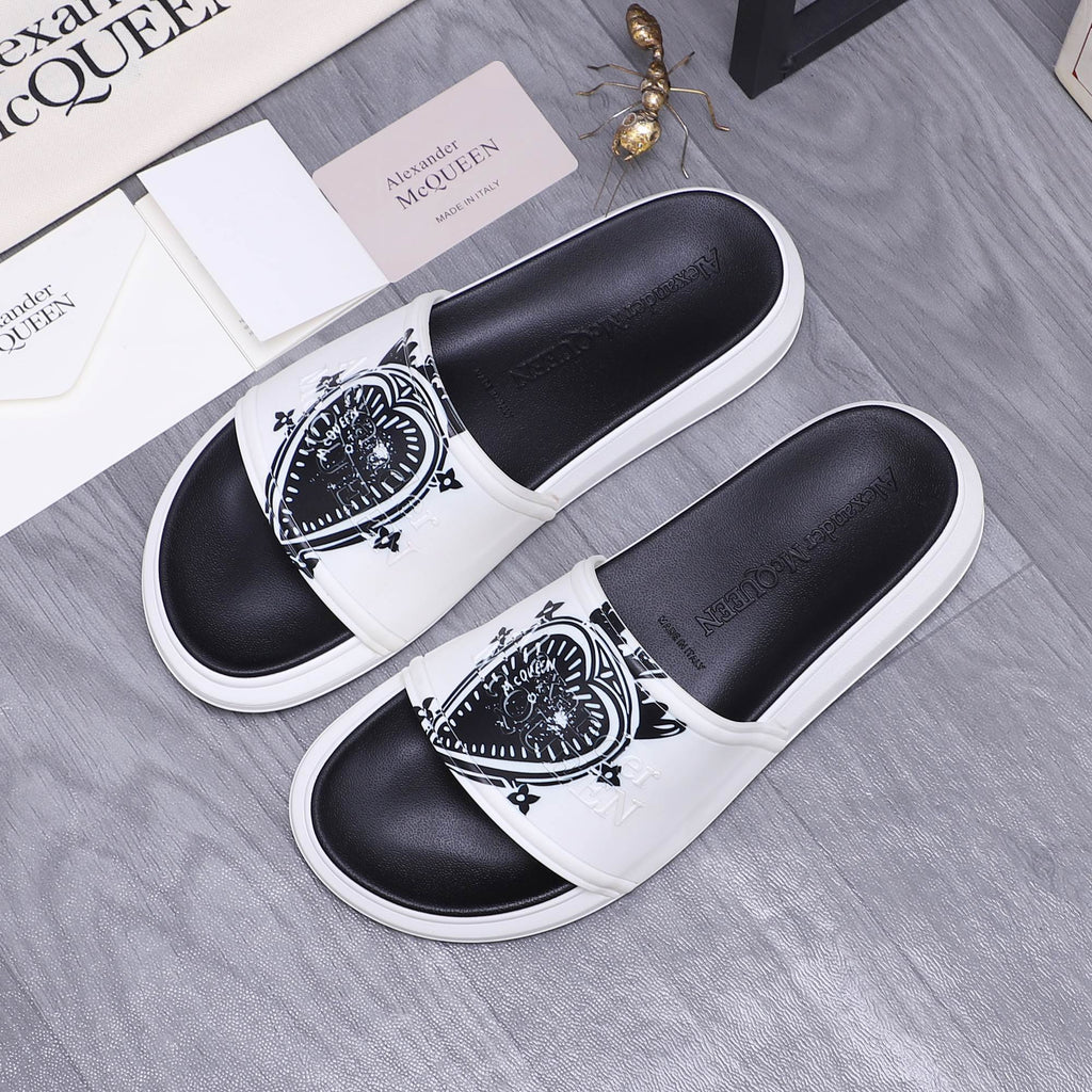 Alexander McQueen slide sandals, white strap with black graphic crest