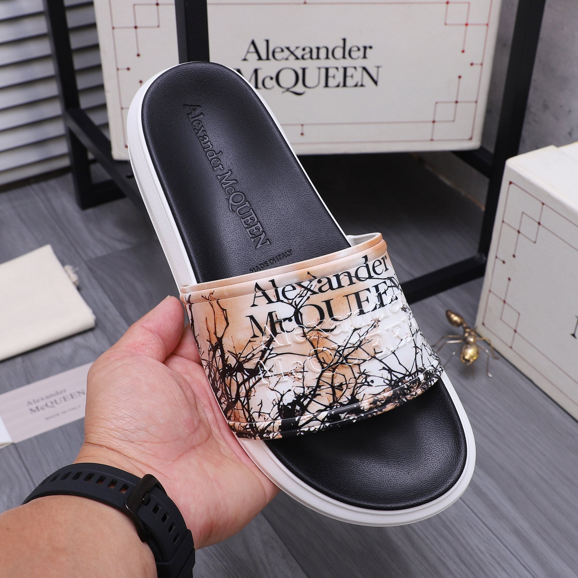 Alexander McQUEEN slide sandal with beige-and-black graphic print band and white sole