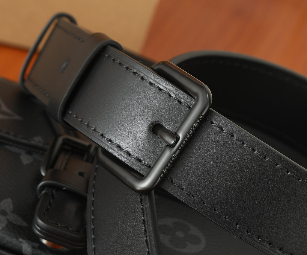 Louis Vuitton crossbody bag strap close-up with stitched leather tab and rectangular buckle