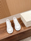 White leather low-top sneakers, lace-up with rubber sole