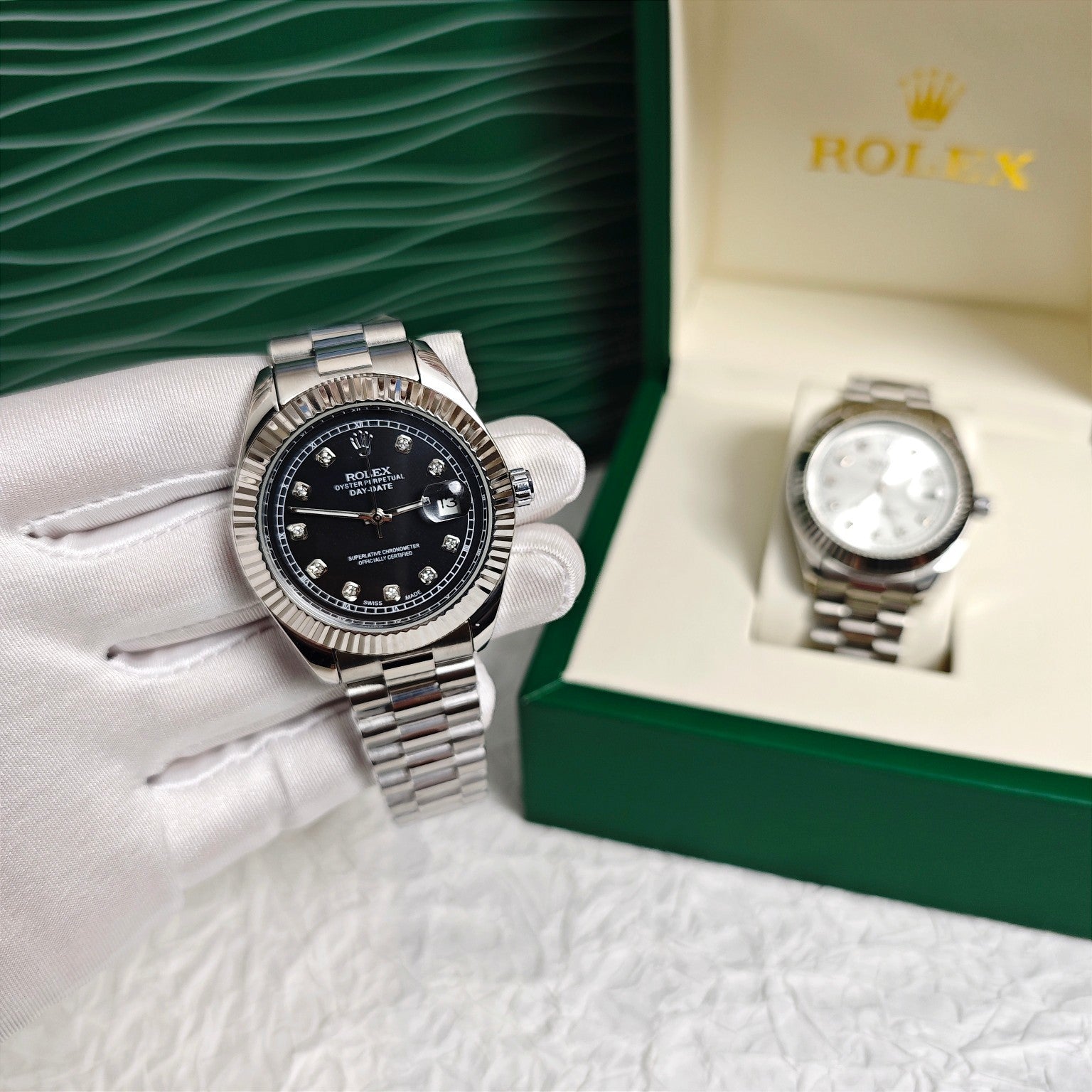 Rolex wristwatch in open box, black dial, steel bracelet and bezel