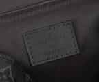 Louis Vuitton Apple label patch on black fabric bag lining