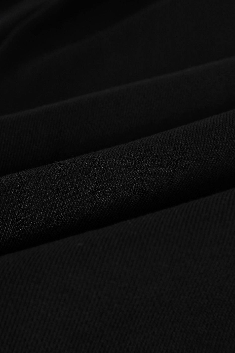 Balenciaga pants black woven fabric close-up with fine texture