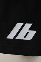 Balenciaga pants logo patch on black fabric