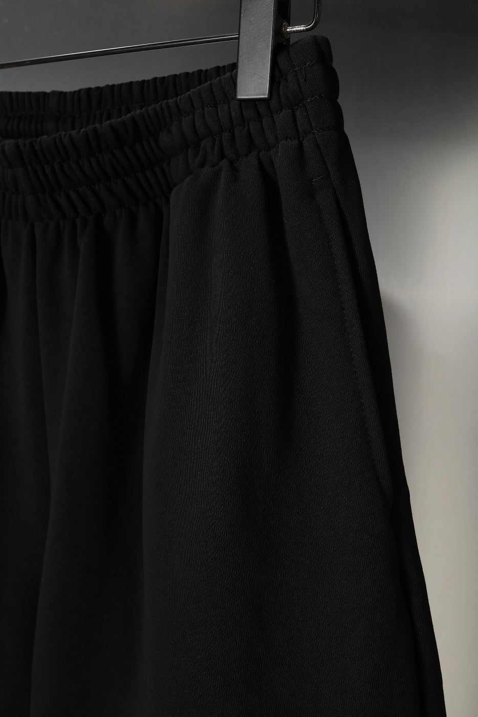 Balenciaga pants in black with gathered elastic waistband and pleated front