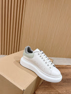 Alexander McQueen white lace-up sneakers with gray collar and side panel