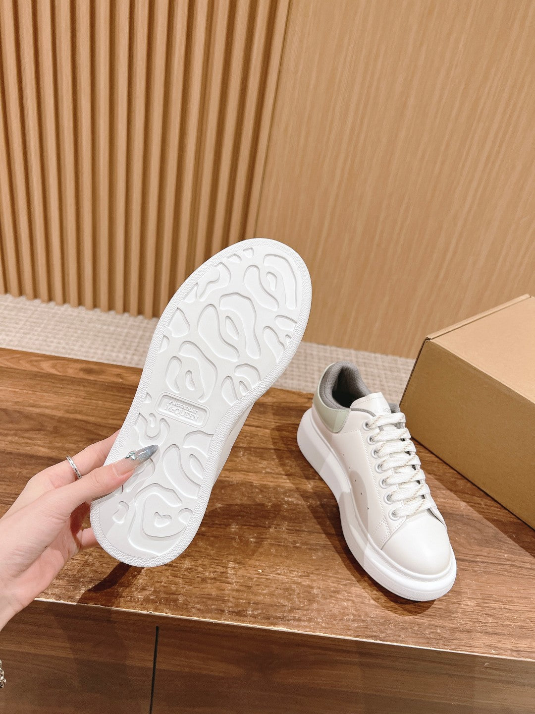 Alexander McQueen sneaker outsole with tread pattern in white rubber